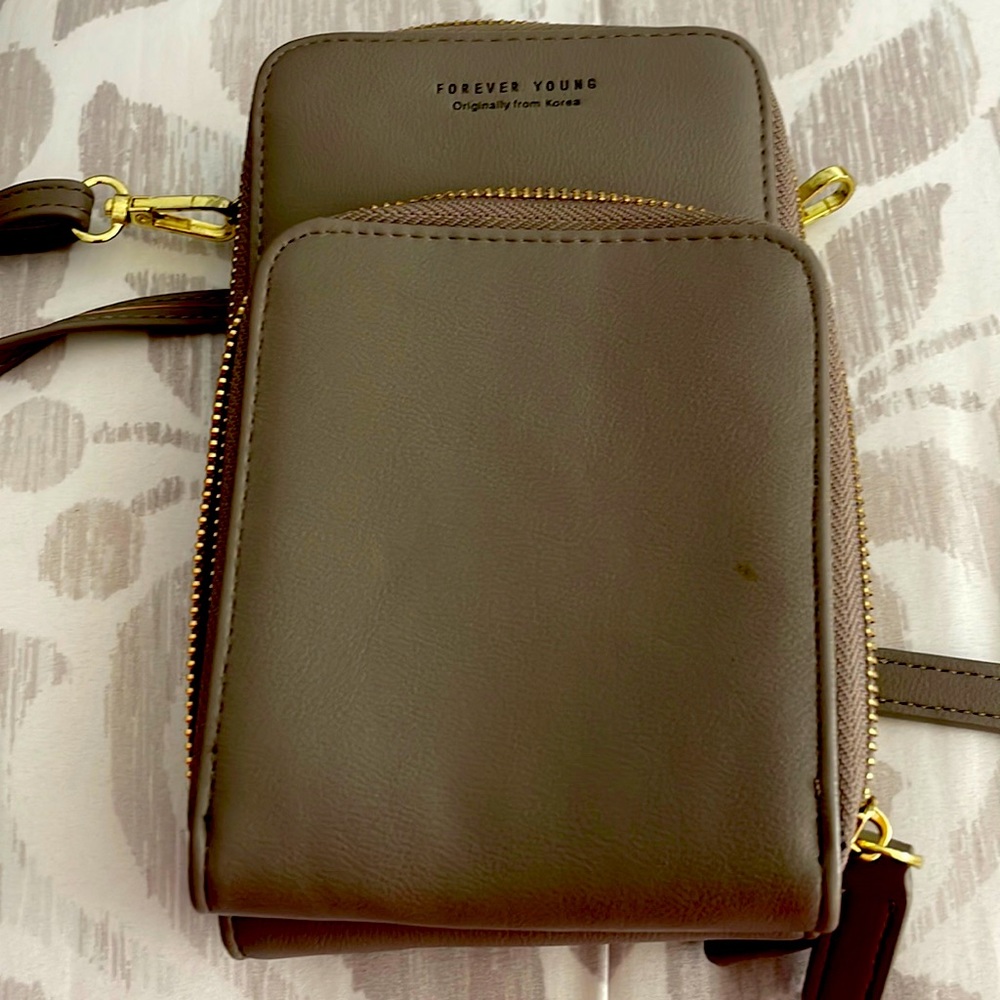Grayish/brown small purse.